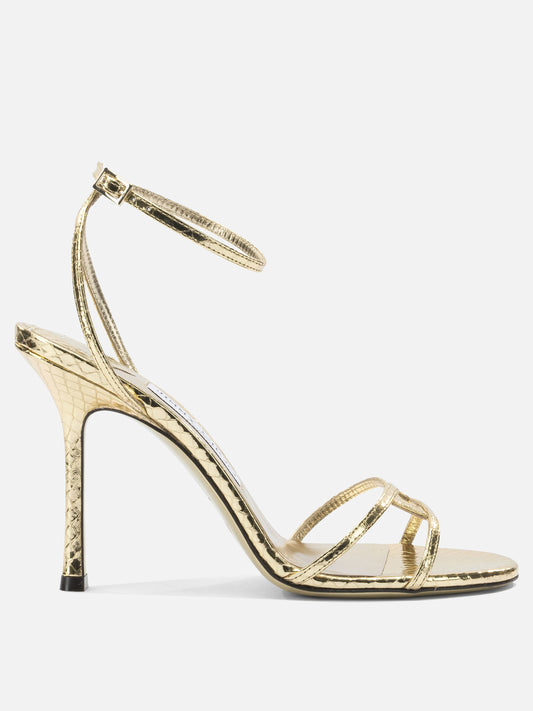 Heeled sandals 1998 LEO 100  Gold - Jimmy Choo Women | PDP | VIETTI Online Store 
