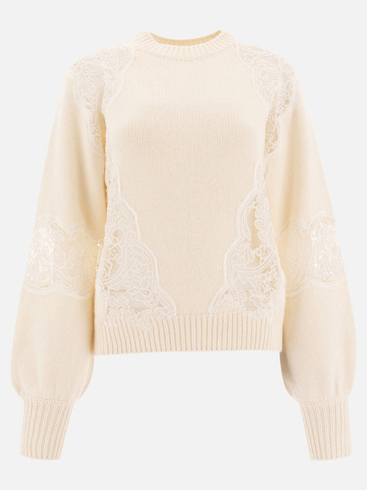 Sweater with lace inserts