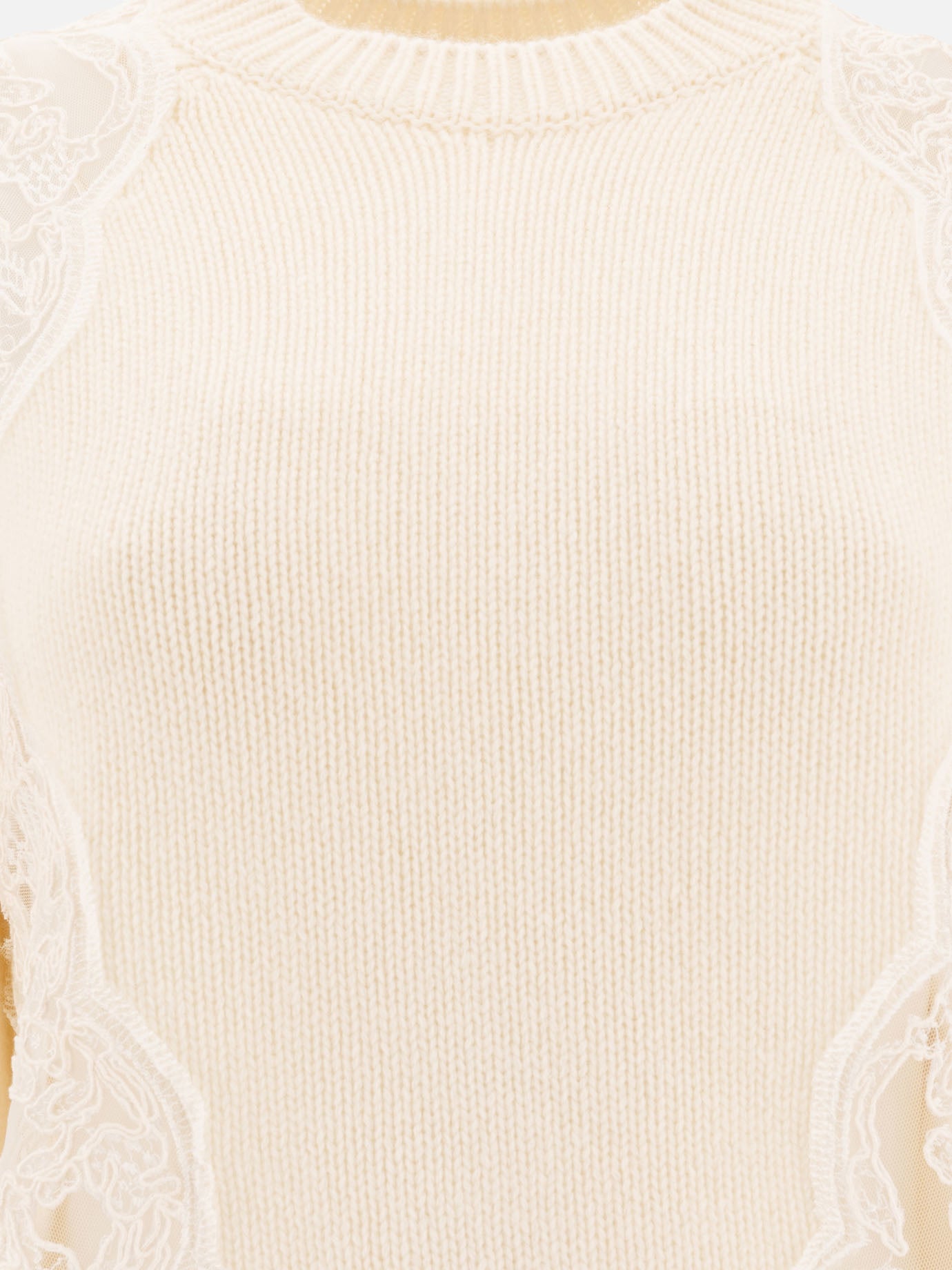 Sweater with lace inserts